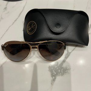 Rayban Polarized Aviator with gold frame, tortoise sides, and brown lens